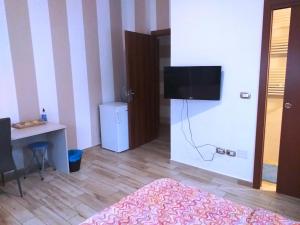 TV a/nebo společenská místnost v ubytování Edoardoapartments1