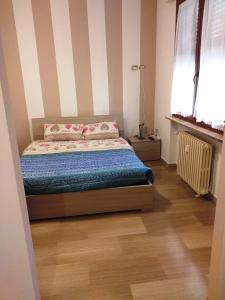 Postel nebo postele na pokoji v ubytování Edoardoapartments1