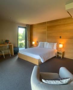 Кровать или кровати в номере La Bicoque