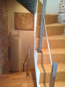 a view of a staircase in a house at Vacation Home Casa Fratelli in Bruges