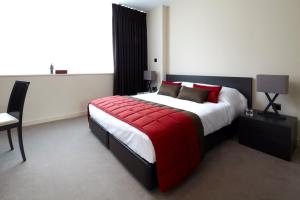 Postel nebo postele na pokoji v ubytování Hotel Xanadu