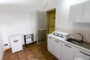 Köök või kööginurk majutusasutuses B&B Macchia Mediterranea +28 fotot