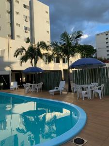 Bazén v ubytování Moura Palace Hotel nebo v jeho okolí
