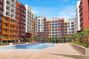 an image of an apartment complex with buildings at lovely 2-bedroom sea view serviced apartment dabolim goa in Dabolim