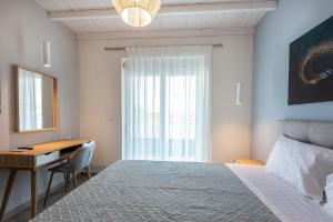 Postel nebo postele na pokoji v ubytování Tamaris Villa
