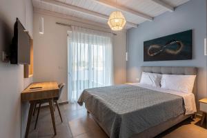 Postel nebo postele na pokoji v ubytování Tamaris Villa