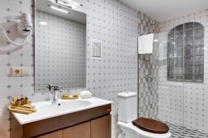 Ένα μπάνιο στο Mukhrantubani Boutique Hotel