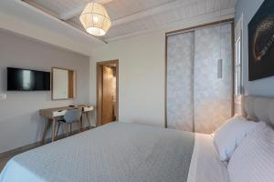 Postel nebo postele na pokoji v ubytování Tamaris Villa