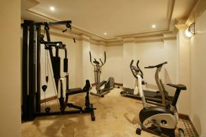 a gym with several exercise bikes in a room at Riad & Spa Esprit Du Maroc in Marrakesh