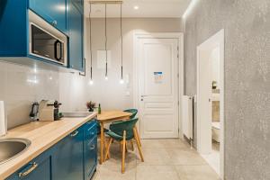 Kuchyňa alebo kuchynka v ubytovaní ZEUS Design Apartments - Reumannplatz