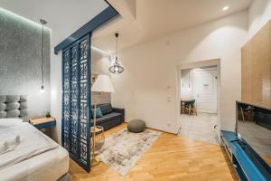 Posteľ alebo postele v izbe v ubytovaní ZEUS Design Apartments - Reumannplatz