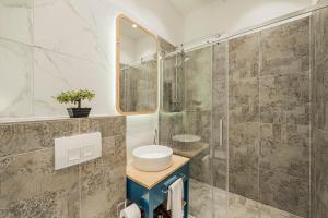 Kúpeľňa v ubytovaní ZEUS Design Apartments - Reumannplatz + 23 fotografií