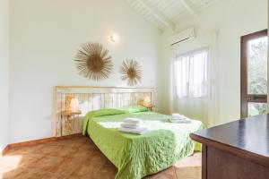 Кровать или кровати в номере Albergo Residenziale Menhirs