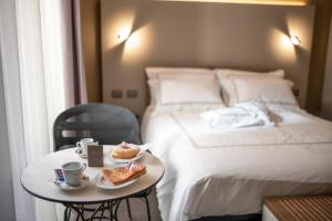 A bed or beds in a room at B&B il Divino