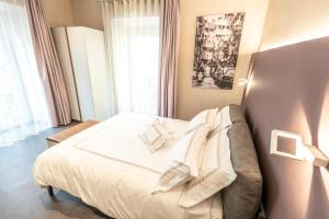 A bed or beds in a room at B&B il Divino
