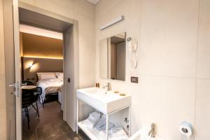 A bed or beds in a room at B&B il Divino