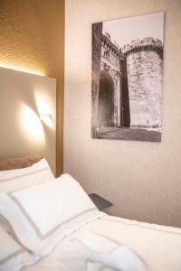 A bed or beds in a room at B&B il Divino