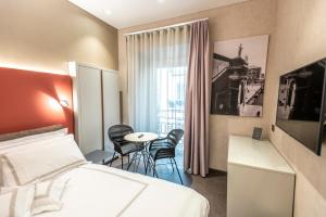A bed or beds in a room at B&B il Divino