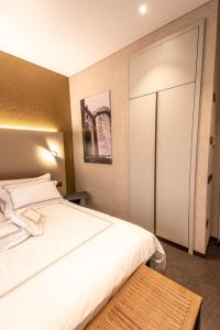 A bed or beds in a room at B&B il Divino