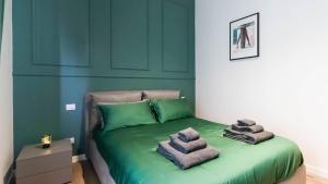 A bed or beds in a room at Cavour 82