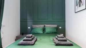 A bed or beds in a room at Cavour 82