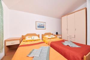 Кровать или кровати в номере Apartman Igor