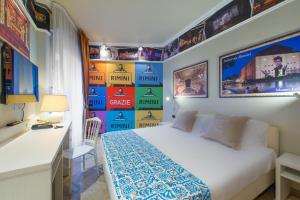 Postel nebo postele na pokoji v ubytování Admiral Art Hotel