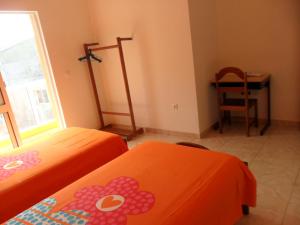Ένα ή περισσότερα κρεβάτια σε δωμάτιο στο Casa Celeste