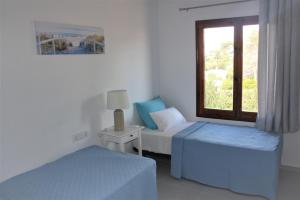 Posteľ alebo postele v izbe v ubytovaní 3 Bedroom Villa, Private Pool, Binibeca, 300m to the Beach + 25 fotografií