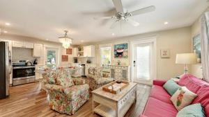 a living room with a couch and a table at Canal Lower-Gorgeous 3 bed 3 bath near SK Village in Siesta Key