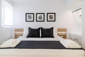 Postelja oz. postelje v sobi nastanitve Stipa luxury apartment