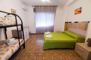 Postel nebo postele na pokoji v ubytování Sea Salento Casa Vacanze