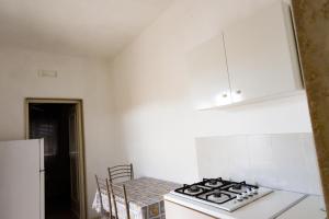 Kuchyň nebo kuchyňský kout v ubytování Sea Salento Casa Vacanze