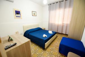 Postel nebo postele na pokoji v ubytování Sea Salento Casa Vacanze