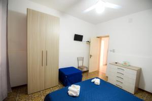 Postel nebo postele na pokoji v ubytování Sea Salento Casa Vacanze