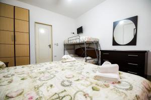Postel nebo postele na pokoji v ubytování Sea Salento Casa Vacanze
