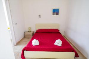 Postel nebo postele na pokoji v ubytování Sea Salento Casa Vacanze
