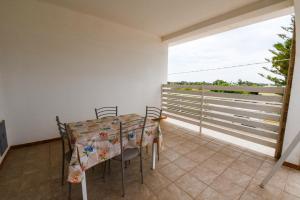 Балкон или терраса в Sea Salento Casa Vacanze +37 фотографий