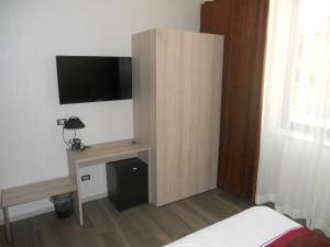 TV a/nebo společenská místnost v ubytování Igiban Hotel + 34 fotografií