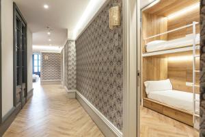 A bed or beds in a room at Weflating City Center