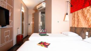 Ein Bett oder Betten in einem Zimmer der Unterkunft ibis Barranquilla