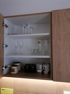 Kuchyň nebo kuchyňský kout v ubytování Apartman Pahuljica Tara