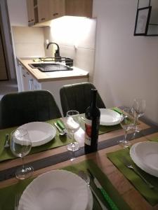Kuchyň nebo kuchyňský kout v ubytování Apartman Pahuljica Tara