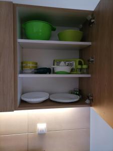 Kuchyň nebo kuchyňský kout v ubytování Apartman Pahuljica Tara