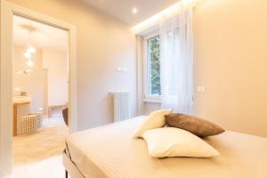Кровать или кровати в номере Casa da Suite Volea