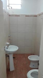 a bathroom with a sink and a toilet at DEPARTAMENTO CON COCHERA in La Rioja