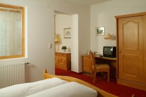 TV a/nebo společenská místnost v ubytování Hotel-Garni Stern - bed & breakfast & more