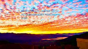a painting of a sunset with the words davis cancer center hotel worshipromyromy at delphi aiolos center hotel panoramic view&yoga harmony hotel&rooms in Delfoi