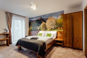 Posteľ alebo postele v izbe v ubytovaní Apartmány Planina Predná Hora