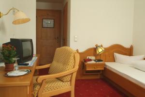 Postel nebo postele na pokoji v ubytování Hotel-Garni Stern - bed & breakfast & more